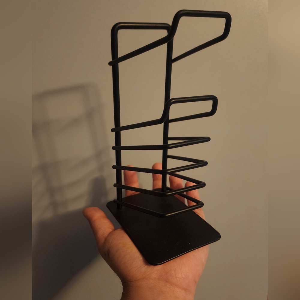 Black Metal Wall-Mounted Storage Rack